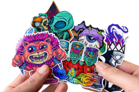 Colorful assortment of stickers from the Monthly Sticker Savages Box featuring monsters and whimsical designs for water bottle stickers