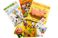 Colorful activity sheets from The Storytime Box featuring counting and addition exercises for children in a subscription box