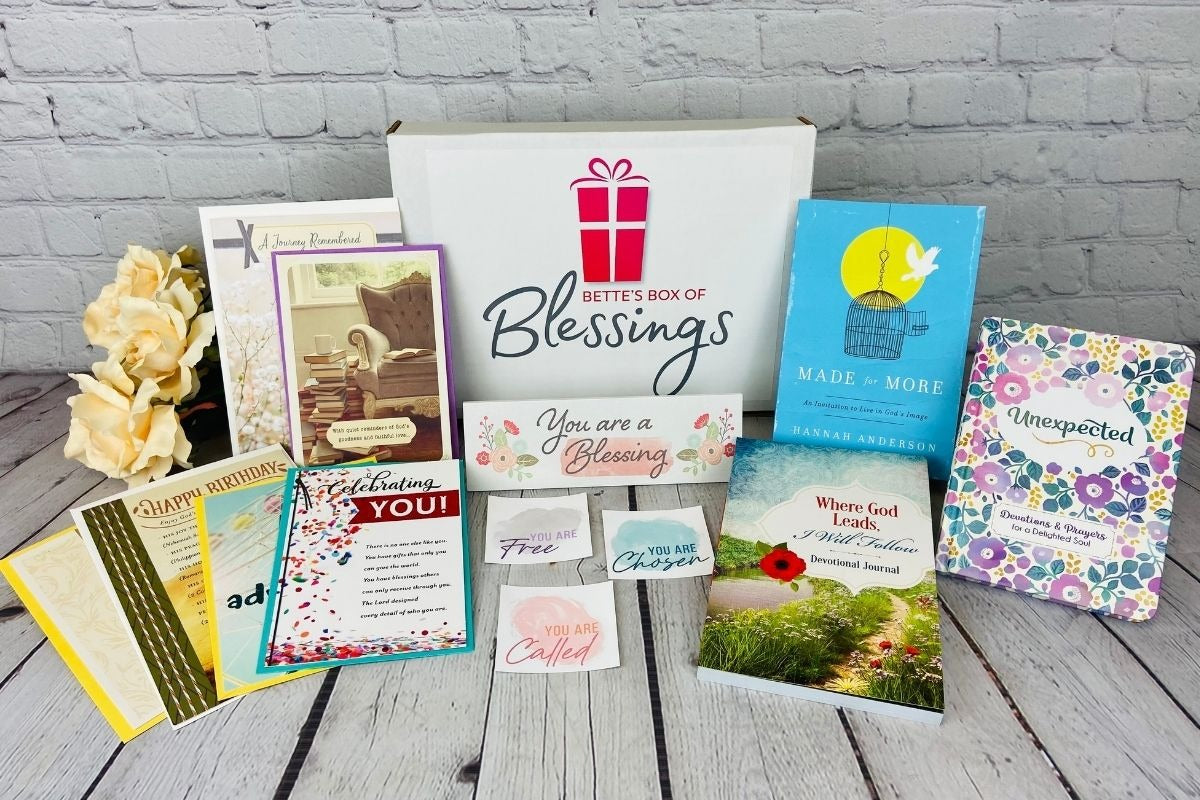 Bette's Box of Blessings subscription box featuring faith-themed items, including devotionals, cards, and inspirational gifts