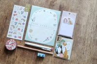 Packs by Misty Co. stationery subscription bundles with stickers, sticky memo, writing paper, letter set, washi tape and writing tools.
