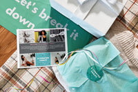 A picture of our clothing subscription box packaged in our sustainable, recycled paper and box. A welcome card is included in each box.