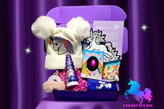 December Unicorn Fun Box 2023 was filled with a warm hat, fun unicorn accessories, candy Unicorn poop, and a hatching Unicorn egg.