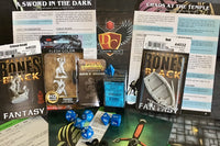 Dungeon Crate™ subscription box featuring exclusive member card, flame miniatures, and a treasure token for roleplaying games