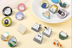 Even more for cat lovers. Cats in coffee mugs, cats taking over the world, and toe-bean society pins. 
