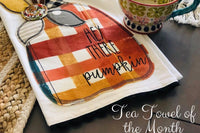 Orange plaid pumpkin applique tea towel