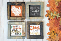 Brown and gray wood framed signs in various designs. Gobble til you wobble, turkey thanksgiving, thankful grateful.