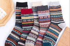 A pair of cozy, knitted socks, woven with a touch of yuletide charm, wraps our feet in warmth, invoking the feeling of sipping hot cocoa.