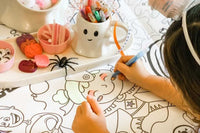 Seasonal kids coloring tablecloths; fun, themed designs delivered monthly for creative playtime all year long. Made in the USA
