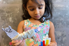 Around the World kit featuring Peru. Preschooler made a llama and pan flute. Kits include letter boards and other activities.