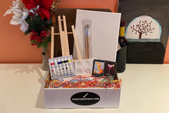 Enjoy a Paint and Sip Box or give as a gift. Each box contains an easel, a canvas, paint, a tray, and brushes. 