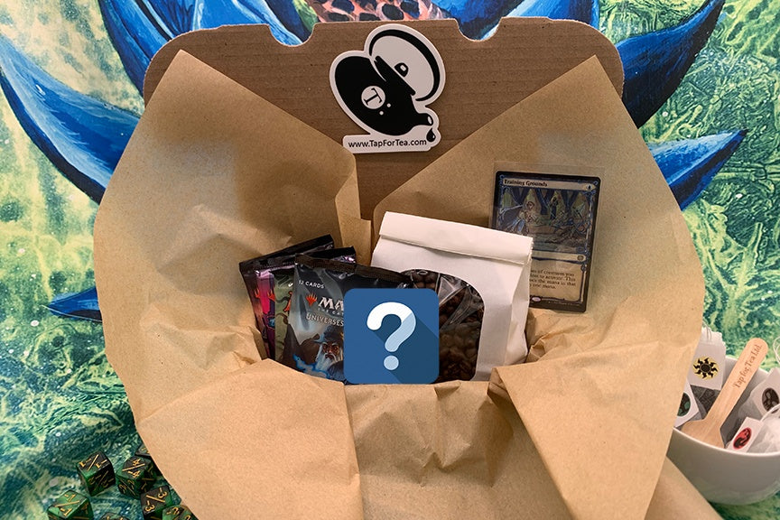 Coffee Mythic Box. Contains four sealed Magic: the Gathering packs, 8oz. premium coffee, one box topper single card, and a surprise!