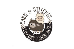 Yarn and Stitches logo with an Alpaca and Sheep along with small socks to indicate this is a Sock yarn subscription box. 