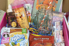 March 2022 My Fragrant Life Deluxe Scent of the Month box featuring Peach Lemonade fragrance and peach themed items