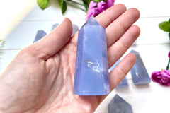 A photo of a blue chalcedony point offered by Soul Gifts Crystals as an example of a crystal of the month.