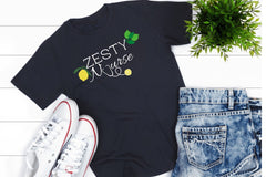 Navy blue tshirt that says Zesty Nurse with lemons and limes and the U in Nurse is a stethoscope with a lemon at the end, white converse 