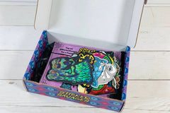 Colorful assortment of stickers from the Monthly Sticker Savages Box featuring monsters and whimsical designs for water bottle stickers