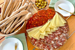 The IbericoTapas box spread, including an exquisite selection of Iberico cured meats, manchego cheese, manzanilla olives and breadsticks.