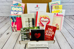 Bette's Box of Blessings subscription box featuring faith-themed items, including devotionals, cards, and inspirational gifts