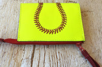 Softball leather coin purse. Stitched like a softball with enough room for cash, cards, chap stick, and more