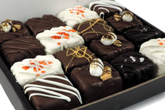Image of a box of our Summer Combo including our summer flavors, the S'mores Brownie Bite and the Creamsicle Bite.