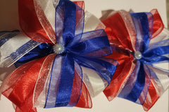 A lovely bow for the 4th of July, Memorial Day, Veterans Day, or any day! The star of our July selection!