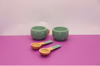 A picture of two teacups and two spoons from the Afternoon Tea Set toy. Possible inclusion into the Toddler Toy Treasure Box. 