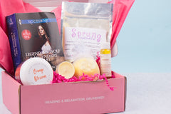 Bubbles & Books subscription box featuring a romantic novel, handmade soap, and bath products for relaxation