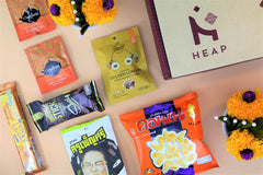 HEAP Brand snack box changes themes every month. Thai light festival themed snacks include delicious shiny treats and classic snacks