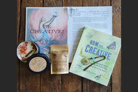 BOX CONTAINING OHM BOX ITEMS FOR THIS THEME: CREATIVITY                                                           