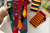 Classic cable-knit socks, in the festive color palette of red and white, radiate comfort and the spirit of Christmas, reminiscent of holiday