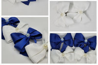 Blue and white coupled with pearl embellishments stand out at any event. Clean and crisp while fun and playful.