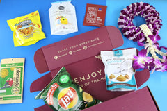 Thai snack box with a blue theme. Heap Brand thai snack subscription box offers monthly delivery of delicious snacks from Thailand