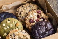 Each box comes with a variety of flavors from our bakery. Perfect for a gift or keep for your family 