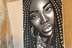 Artistic designed card.  Full face of a beautiful African American Women with hoop earrings and long nubian braids.
