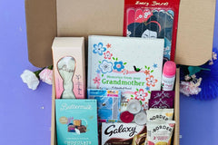 A Grand Smile: Monthly box of luxury gifts, treats and items essential for daily elderly living. Helping you send love and show care to the special senior in your life.