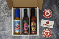 SCOVILLED subscription box featuring Angry Goat Pepper Co., Culley's, and Elijah's Xtreme Regret Reserve.