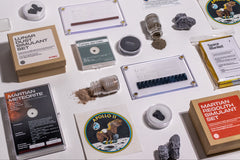 A wide selection of the space-related artifacts and items that have been featured in past Matter boxes