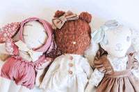 Exclusive Subscription of two handmade fabric dolls for children.