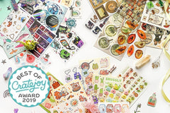 Items from a STICKII Club subscription box, including stickers of cactuses, animals, insects, planets and cute designs.