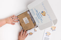 Read It & Eat Blind Date with a book.  Each box contains a food story, an artisanal snack, and a $5 donation to fight hunger in Buffalo, NY