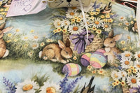 Top design of the reversable centerpieces table toppers for the March box. The design is bunnies, eggs and flowers. 