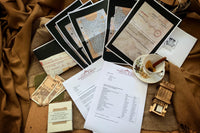 Solution envelope, wooden box, notepad, rupees, photocopied documents and the final part of the story before the denouement