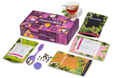 Colorful subscription box from TeaFavors featuring personalized tea blends and four premium tea packets including black and herbal teas