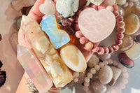 Our Moon Beam Crystal Confetti is a blend of clear quartz, black tourmaline, shungite + labradorite crystal chips with a black obsidian moon