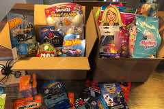 Packing up the toys for the girls and boys. Some of our past boxes! Boxes will vary with each shipment!