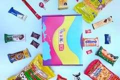 Pachanga Box with the Snacks from Peru in a circular fashion. They have a light blue background and look tasty. 