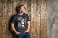 A man swearing a Death Star/Stormtrooper Tshirt with the Death STar being destroyed. The shirt says "I had Friends on that Death Star",