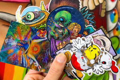 Colorful assortment of stickers from the Monthly Sticker Savages Box featuring monsters and whimsical designs for water bottle stickers