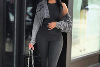 Glam Luxe Box Items: Black fitted jumpsuit, denim cropped jacket, handbag, and blue nail polish. 3 new items every month.