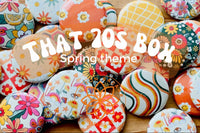 Spring 2023: Seventies theme.  One inch button pins to wear on your jacket, hat, backpack, tote bag. New themes every season.